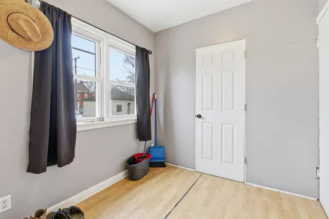 a view of a storage & utility room with a window
