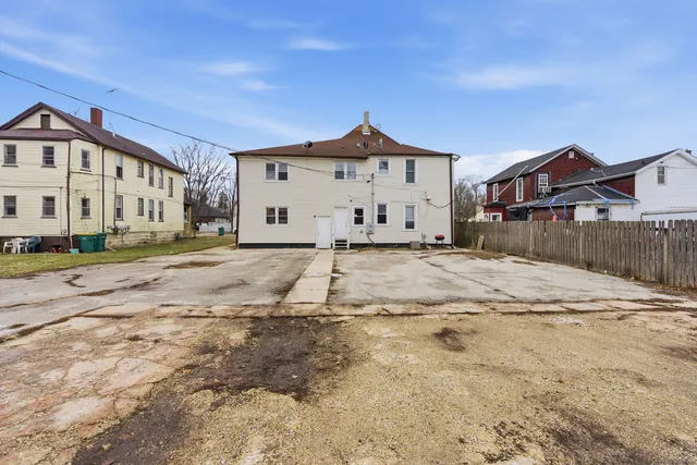 a view of large house with a outdoor space