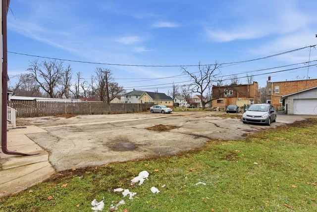 a view of street with parked cars
