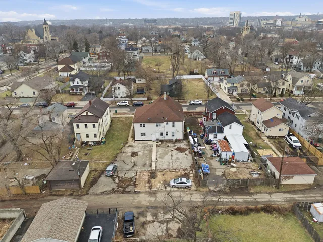 an aerial view of a city with lots of residential buildings