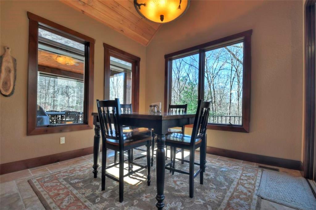 244 Wilderness Way Ellijay, GA 30536 - Photo 18 of 78 a dining room with furniture and window