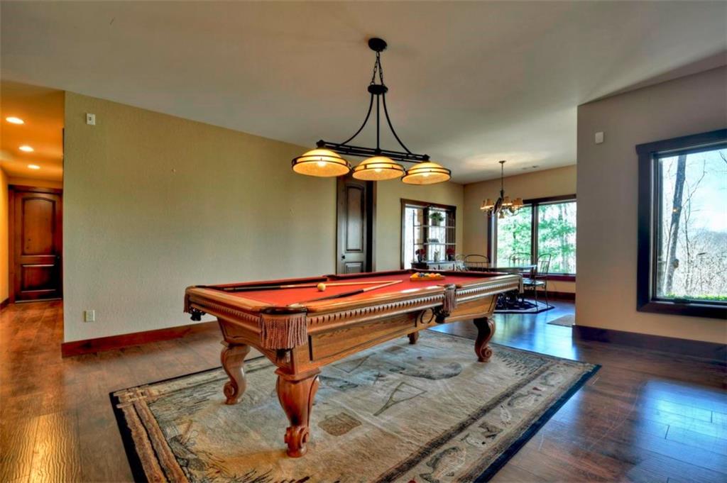 244 Wilderness Way Ellijay, GA 30536 - Photo 34 of 78 a room with pool table and wooden floor
