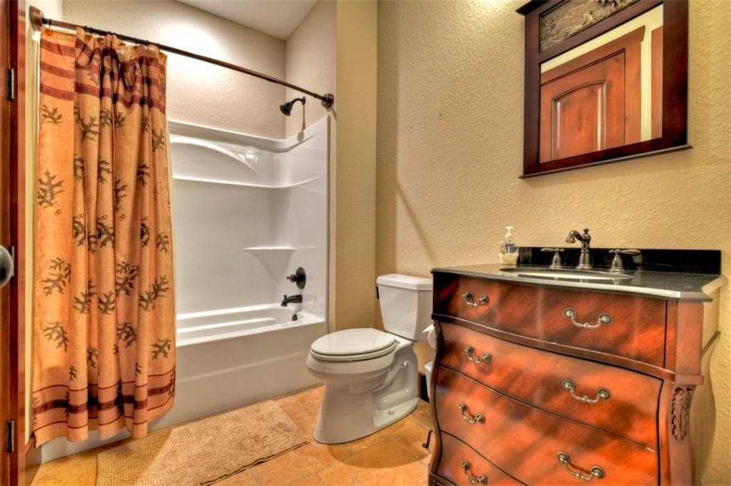 244 Wilderness Way Ellijay, GA 30536 - Photo 41 of 78 a bathroom with a sink and a toilet