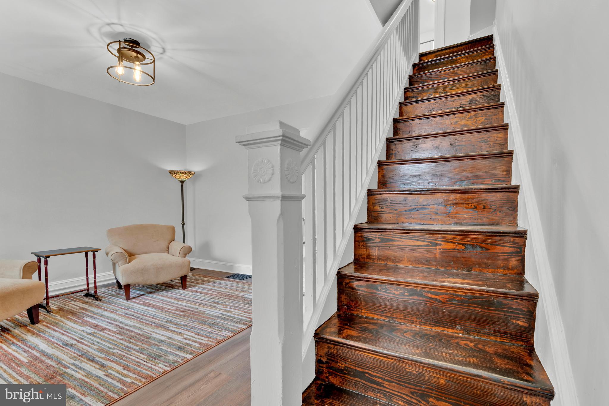 747 East 37th Street Baltimore, MD 21218 - Photo 28 of 53 a view of entryway and hall with wooden floor