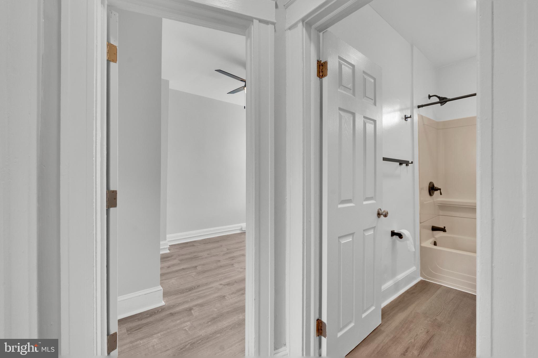 747 East 37th Street Baltimore, MD 21218 - Photo 29 of 53 a view of a bathroom from a hallway