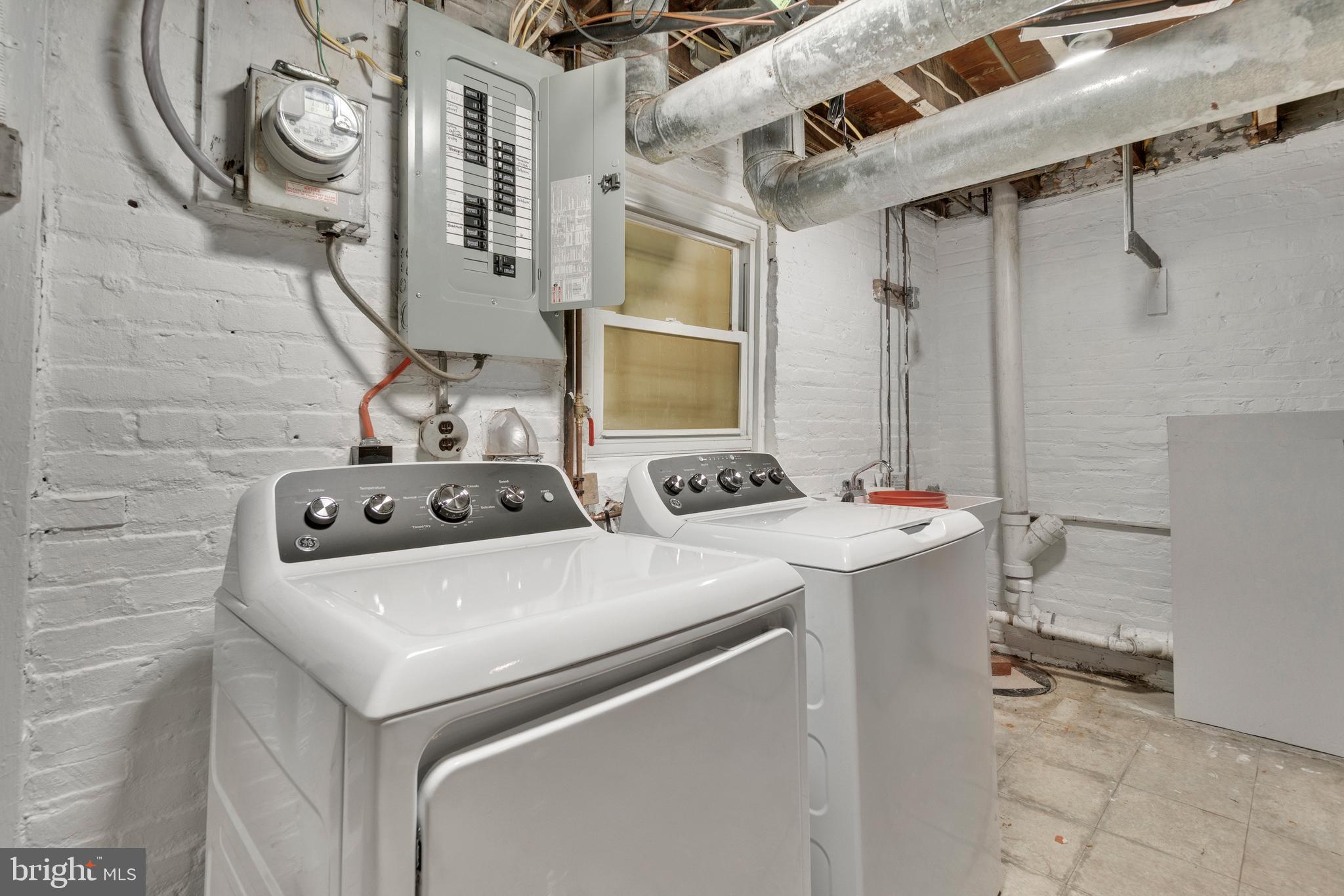 747 East 37th Street Baltimore, MD 21218 - Photo 45 of 53 a utility room with dryer and washer