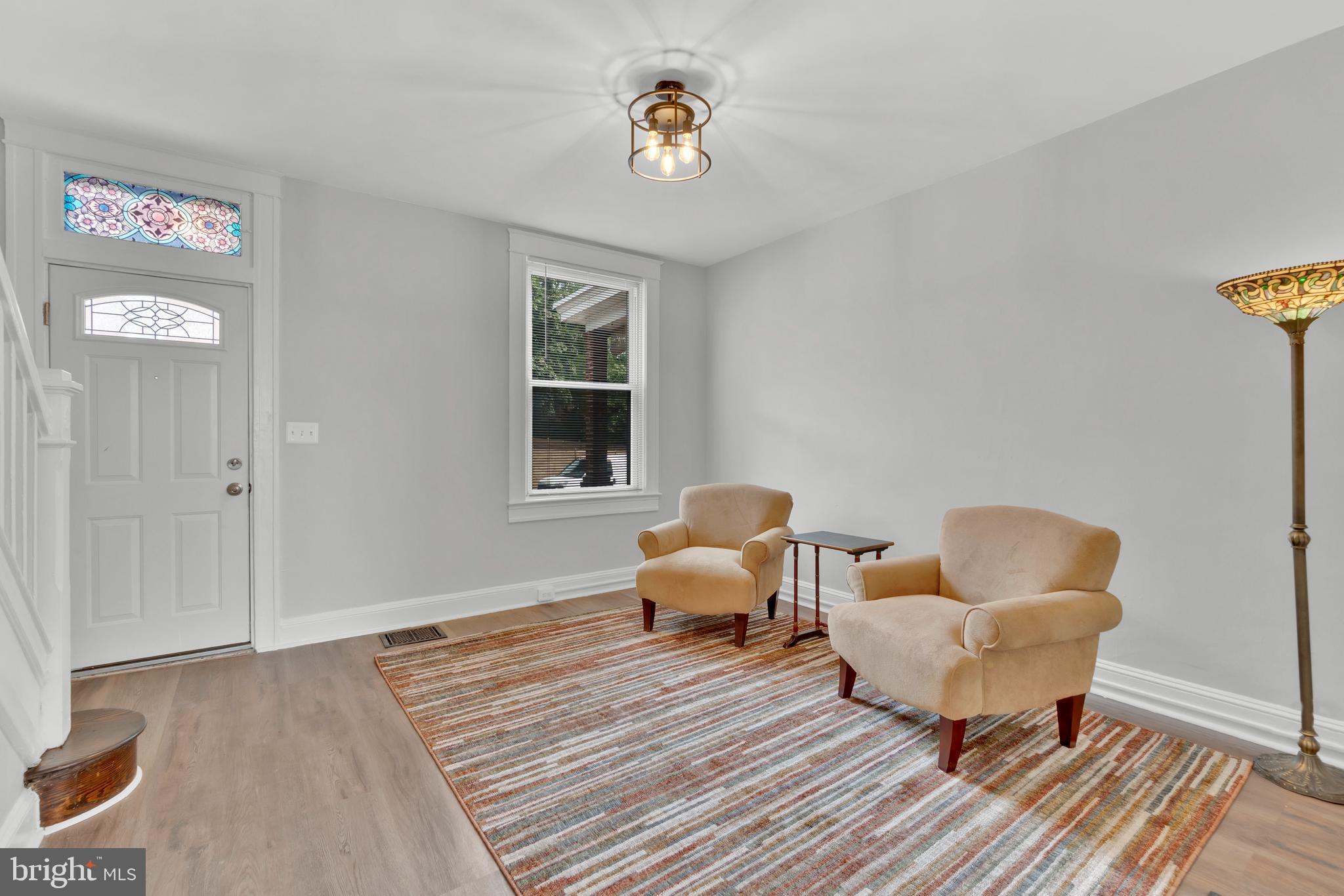747 East 37th Street Baltimore, MD 21218 - Photo 8 of 53 a bedroom with furniture and a window