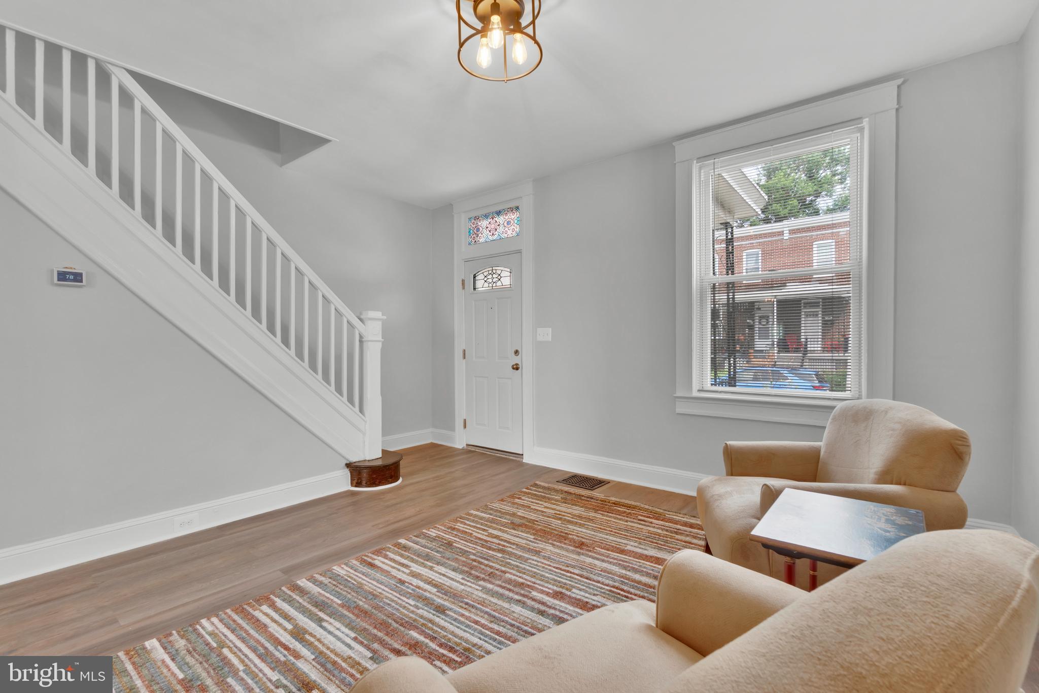 747 East 37th Street Baltimore, MD 21218 - Photo 9 of 53 a bedroom with furniture and a window