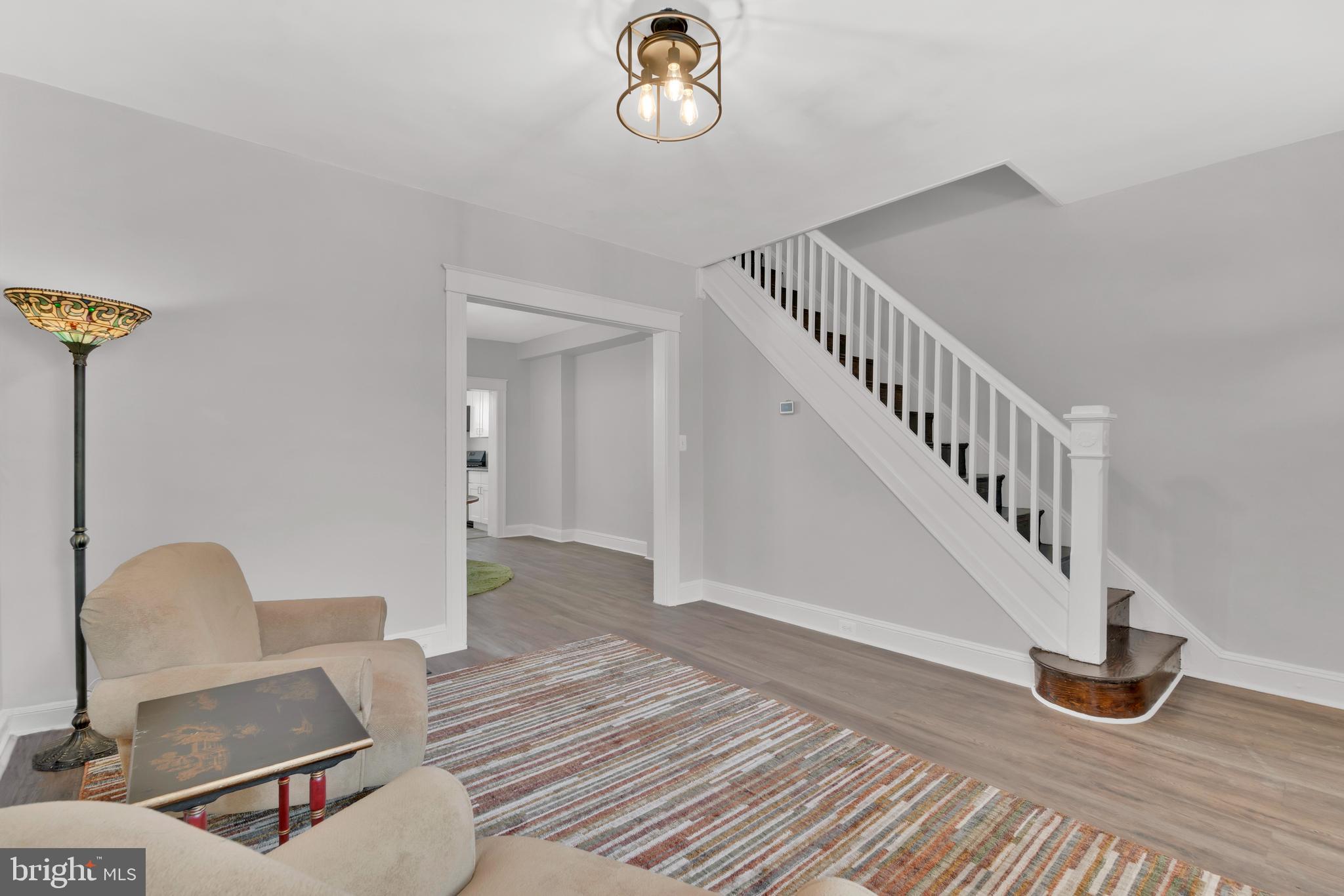 747 East 37th Street Baltimore, MD 21218 - Photo 10 of 53 a view of entryway and hall with wooden floor