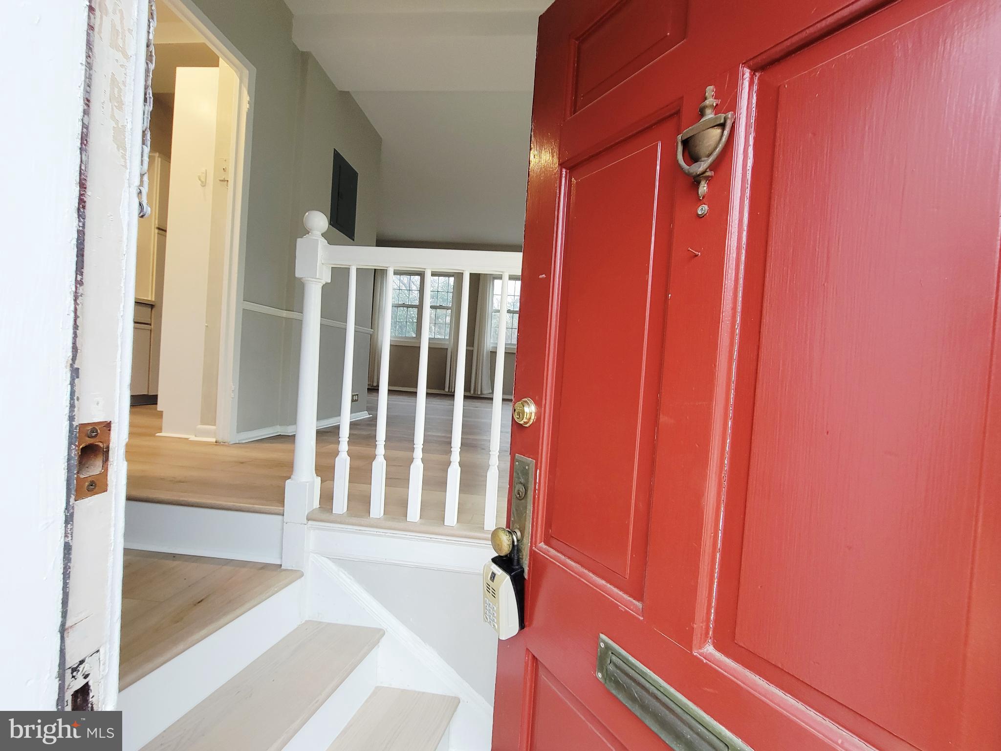 3408 Gunston Road Alexandria, VA 22302 - Photo 1 of 27 a view of a porch with wooden floor and windows