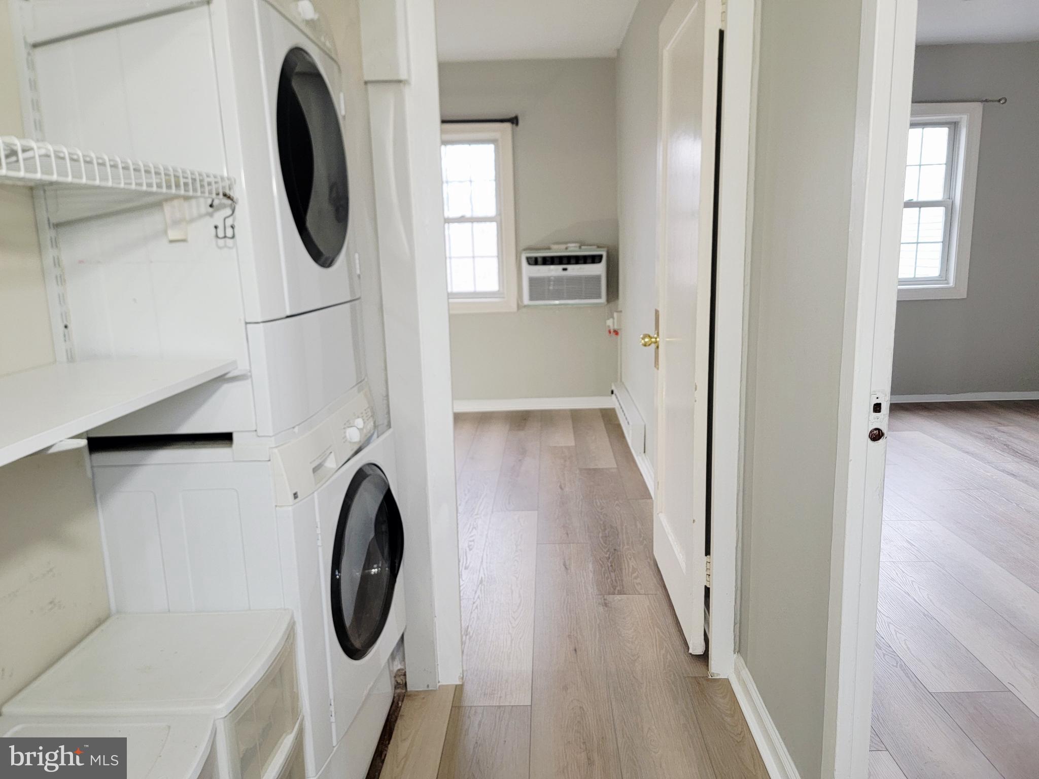 3408 Gunston Road Alexandria, VA 22302 - Photo 19 of 27 a view of a hallway with washer and dryer
