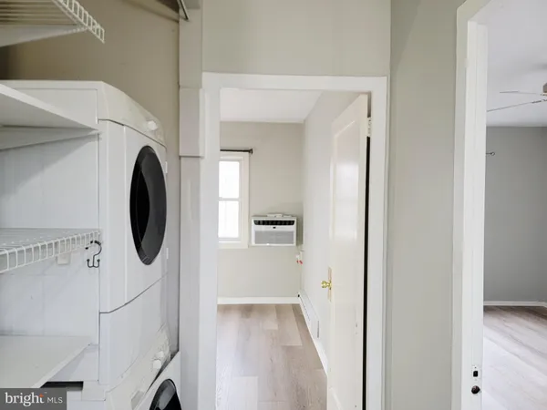 a view of a kitchen with washer and dryer