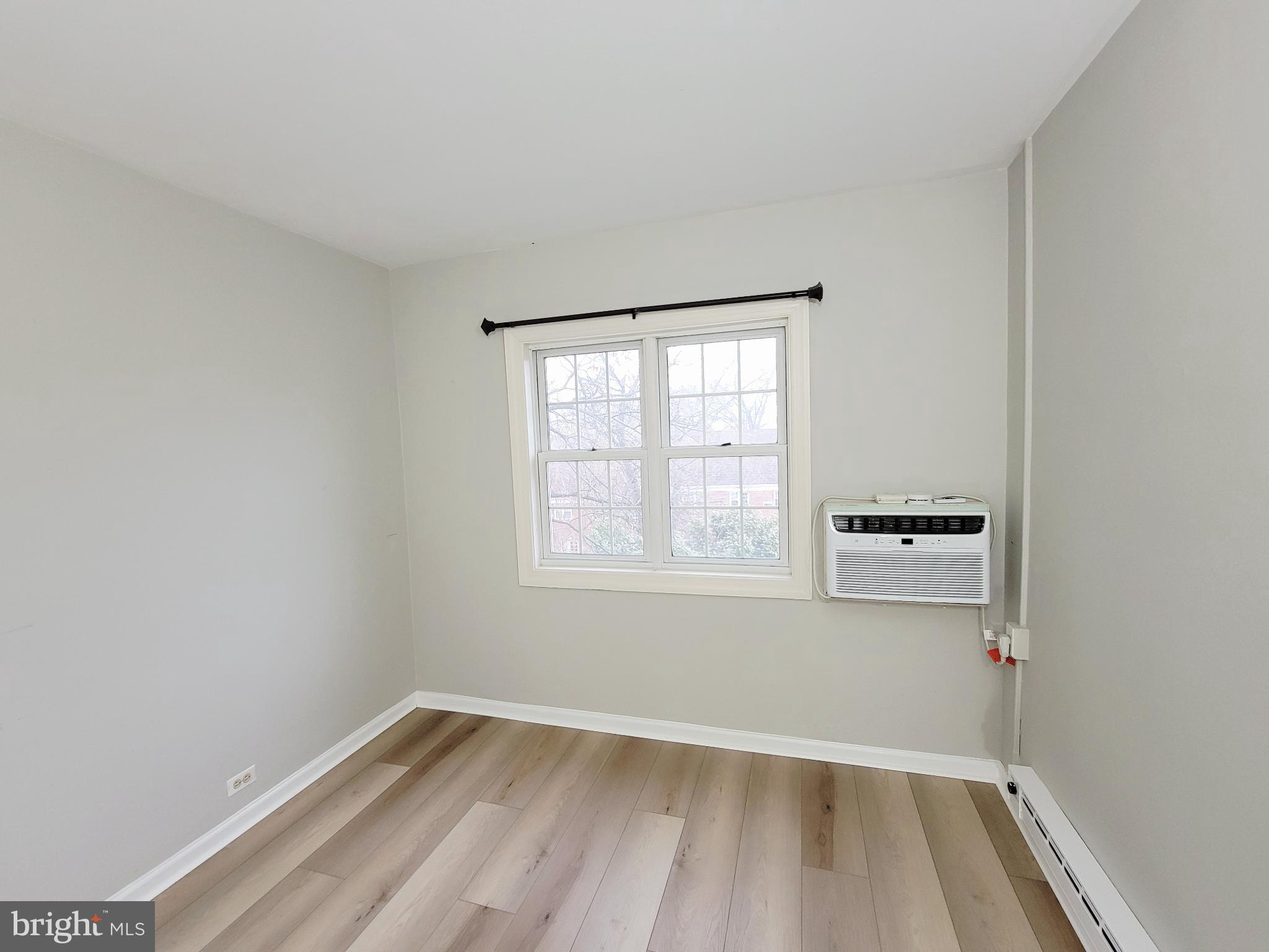 3408 Gunston Road Alexandria, VA 22302 - Photo 23 of 27 an empty room with a window