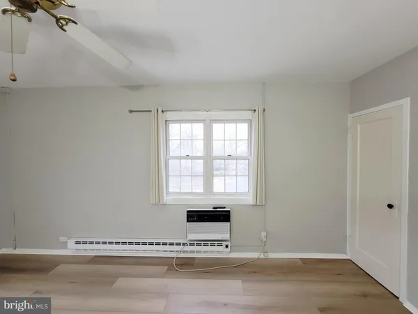 a view of a livingroom with a window