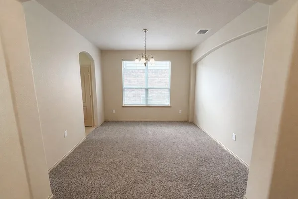 a view of a room and window