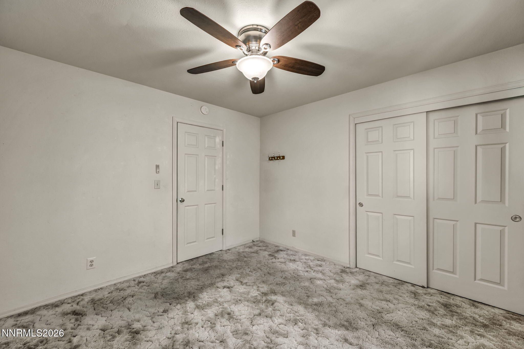 692 Lassen Way Gardnerville, NV 89460 - Photo 22 of 34 a view of an empty room