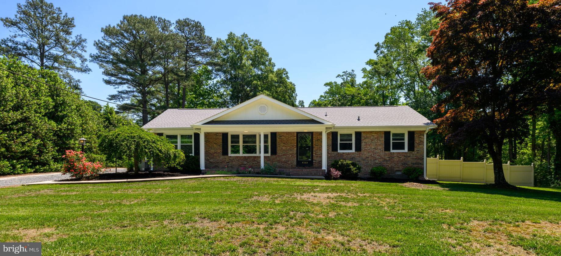 4563 Nutters Cross Road Salisbury, MD 21804 - Photo 1 of 52 a front view of a house with a garden