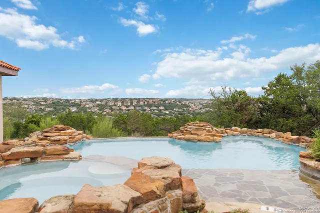 a view of city from terrace with seating space