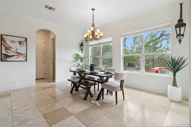 a dining room well furnished