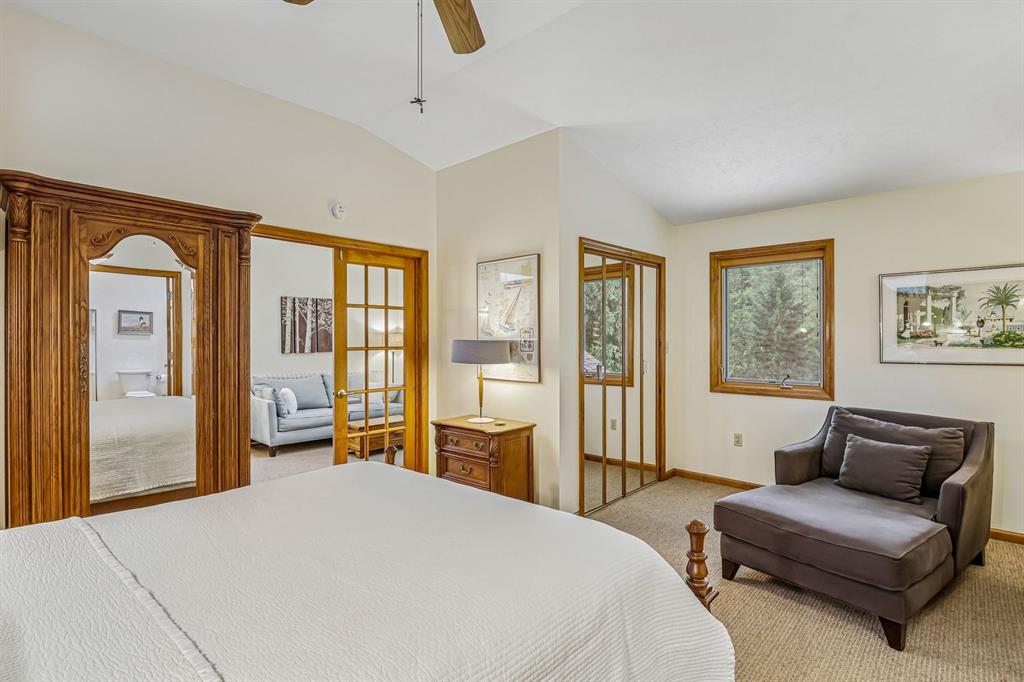 529 Utopia Road Apollo, PA 15613 - Photo 31 of 50 a spacious bedroom with a bed a couch and large window