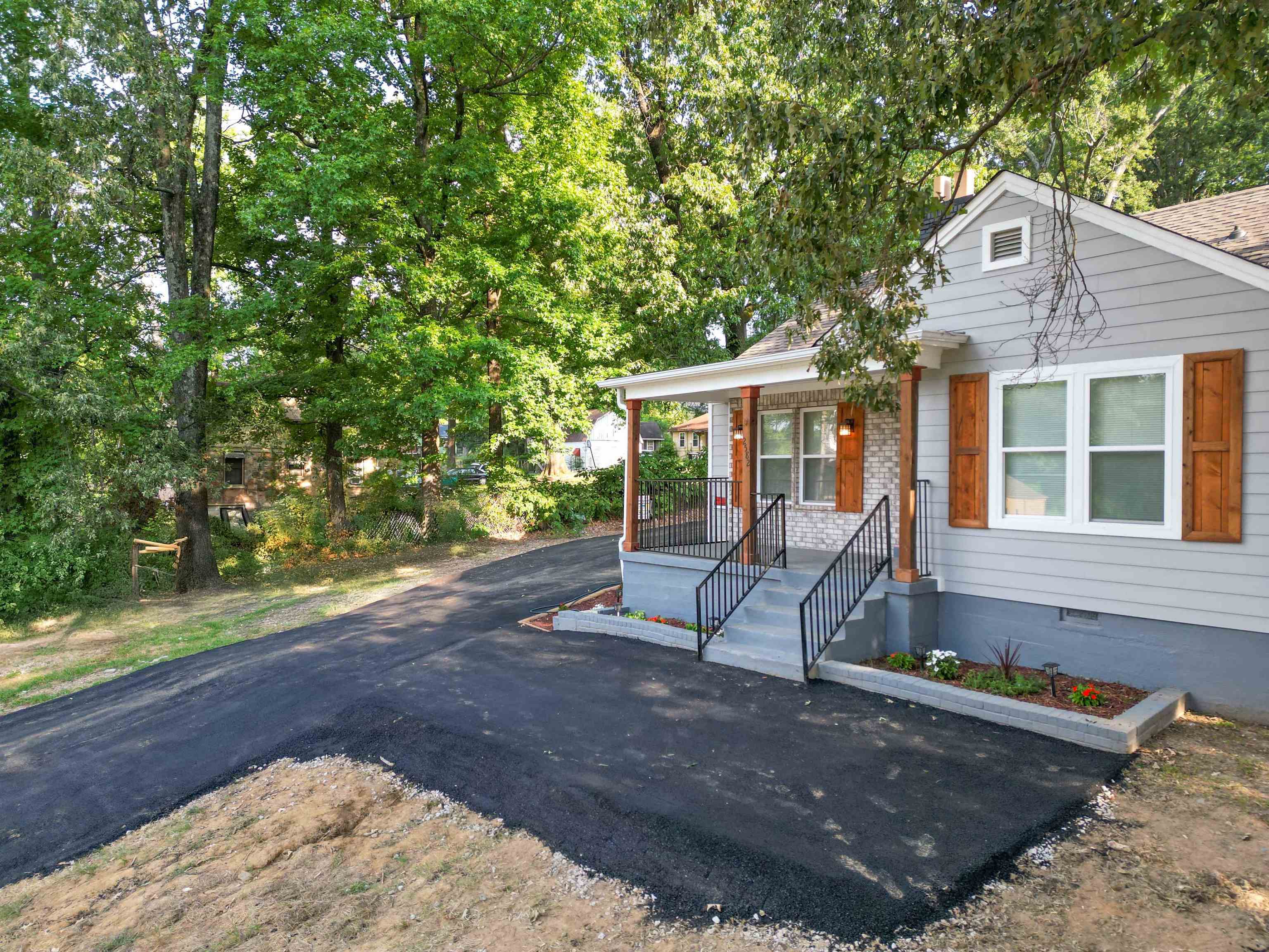 2582 James Road Memphis, TN 38127 - Photo 3 of 36 a front view of a house with garden