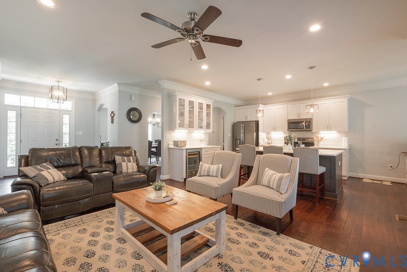 9425 Marie Road New Kent, VA 23124 - Photo 5 of 55 a living room with furniture kitchen view and a chandelier