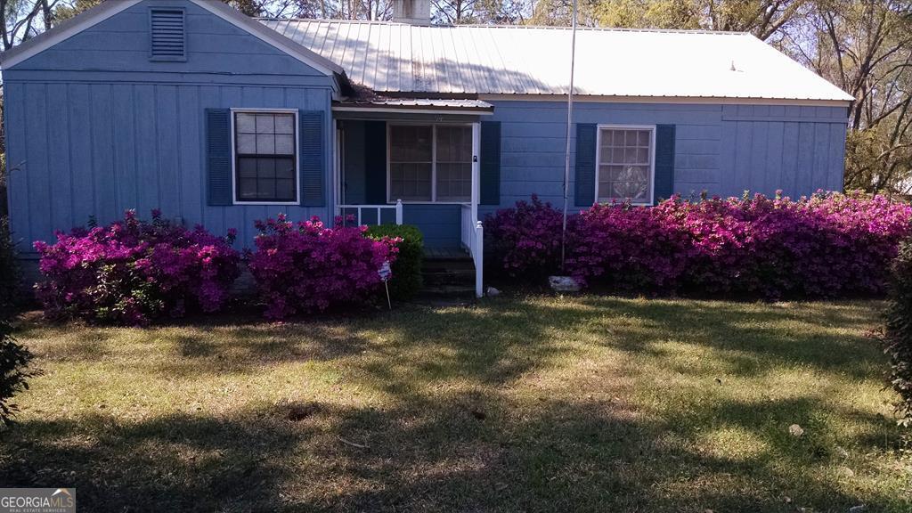 94 Johnson Street Baxley, GA 31513 - Photo 1 of 1 a view of a house with a yard