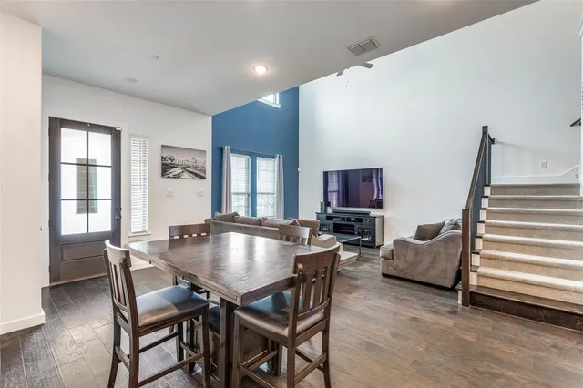 a kitchen with sink stove and cabinets