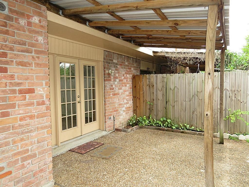 9535 Clanton Street Houston, TX 77080 - Photo 22 of 22 Covered patio ideal for relaxing after work, with easy access to the garage or carport for two vehicles.
