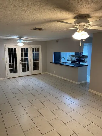 a view of a livingroom with furniture