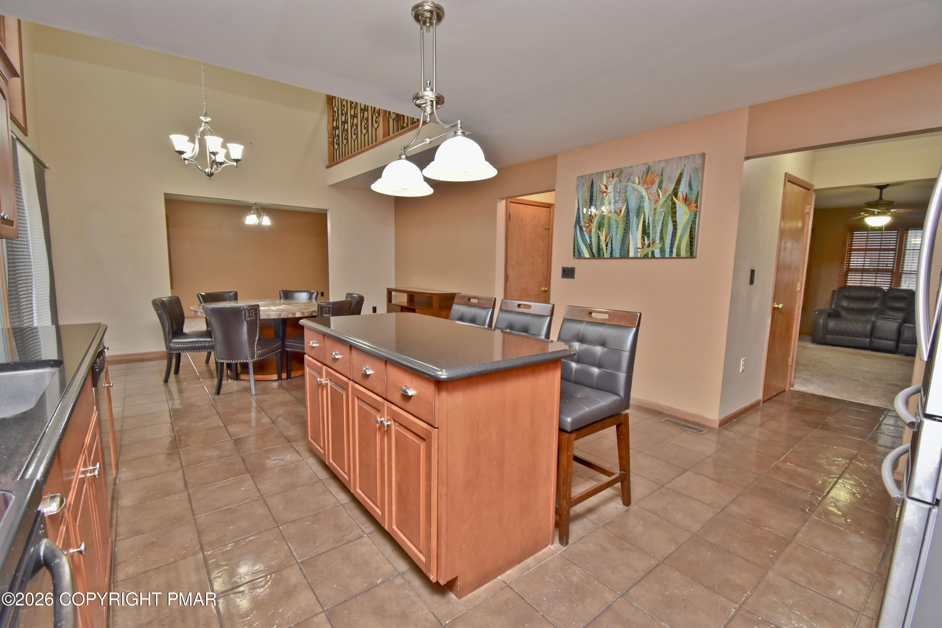 131 Canterbury Road Bushkill, PA 18324 - Photo 19 of 65 a kitchen with stainless steel appliances granite countertop counter space a sink and cabinets