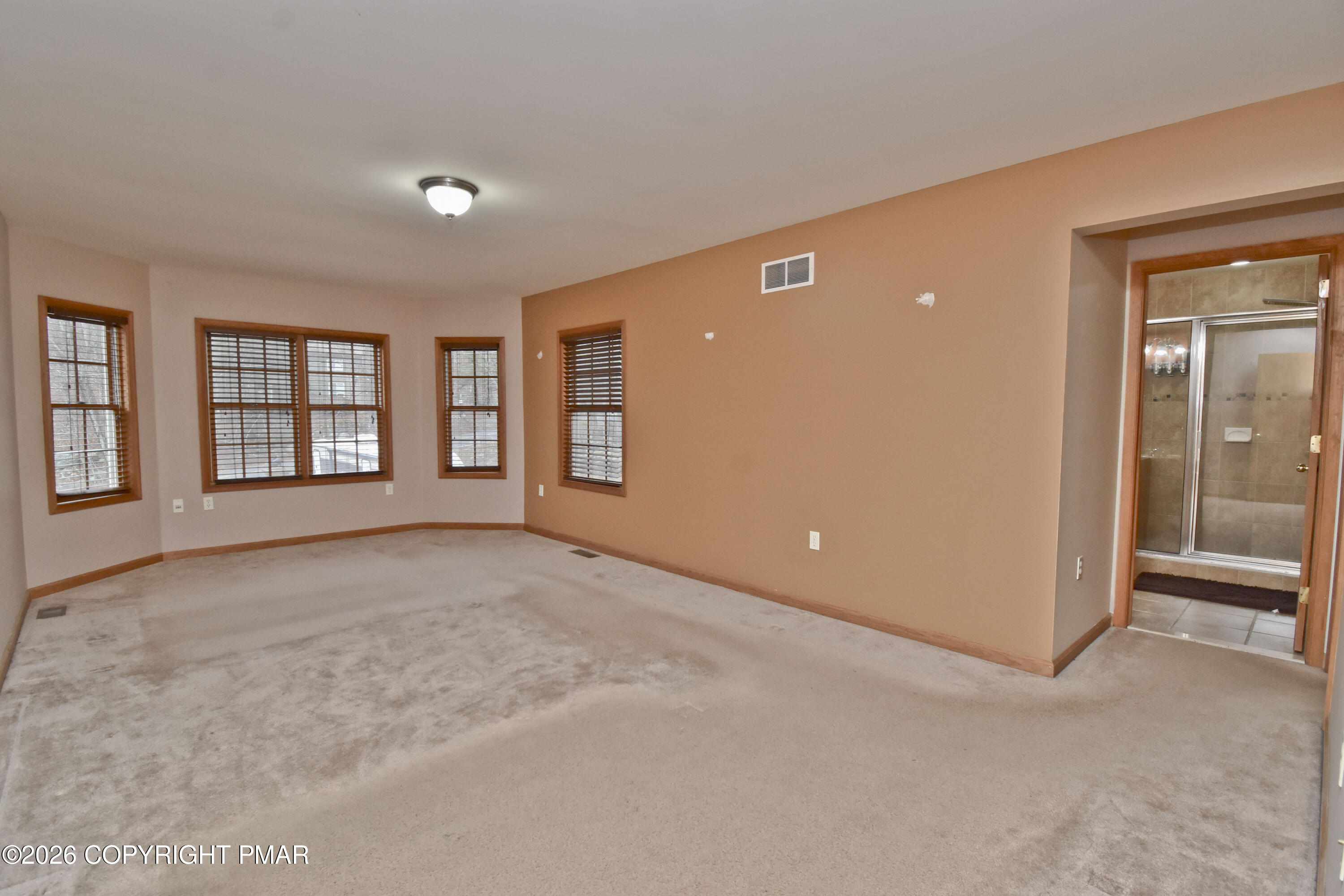 131 Canterbury Road Bushkill, PA 18324 - Photo 26 of 65 an empty room with windows and closet