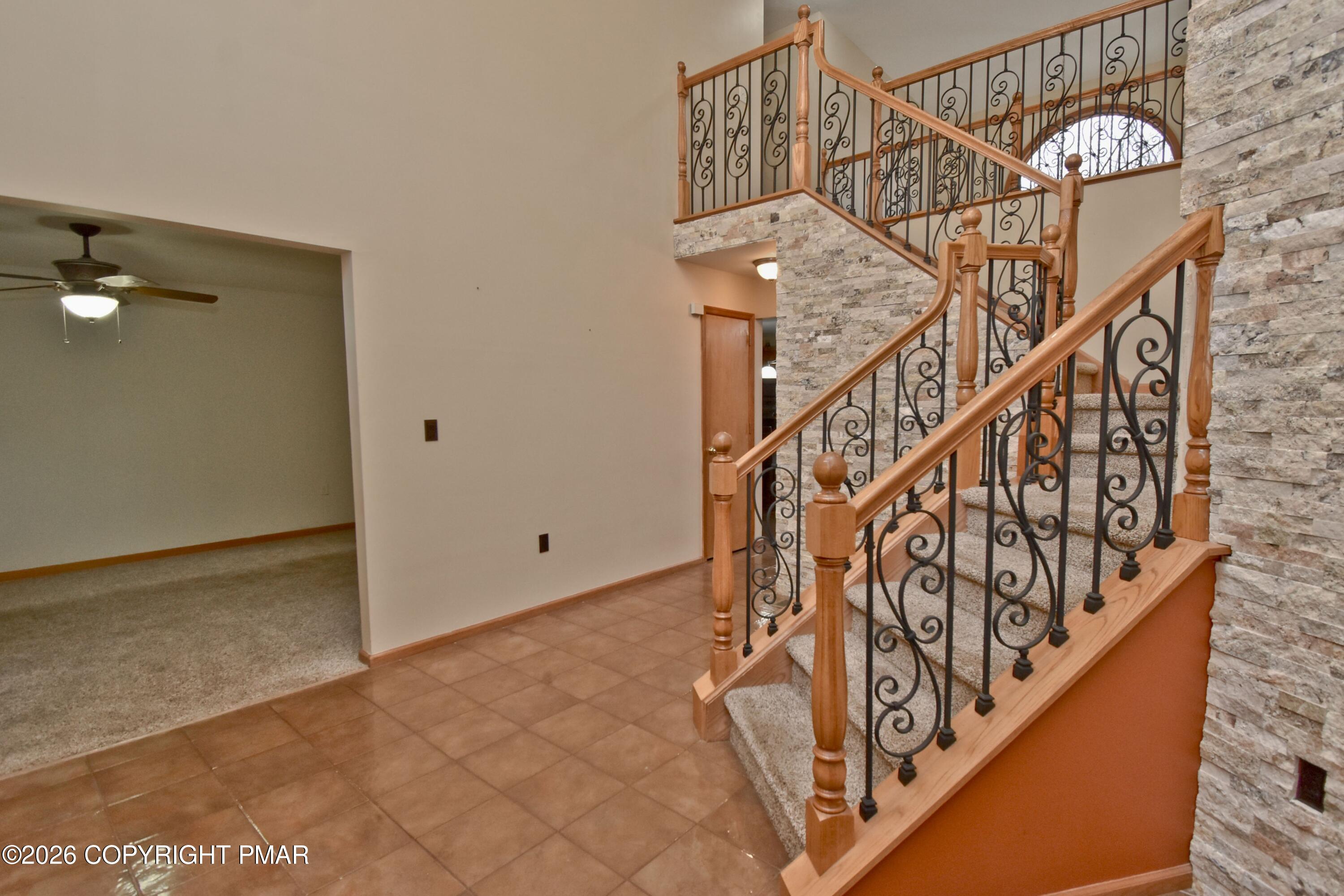 131 Canterbury Road Bushkill, PA 18324 - Photo 3 of 65 a view of entryway with wooden floor