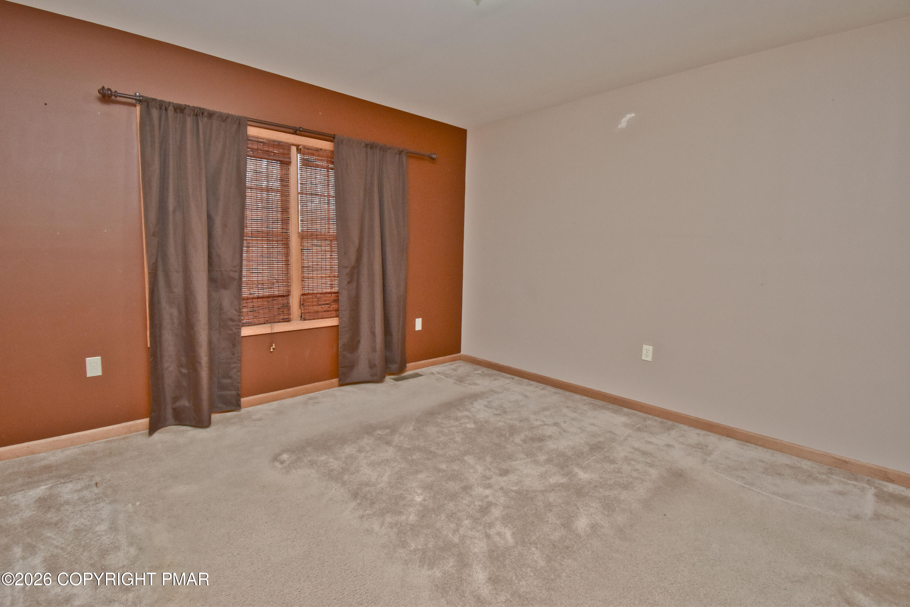 131 Canterbury Road Bushkill, PA 18324 - Photo 35 of 65 a view of an empty room with a window