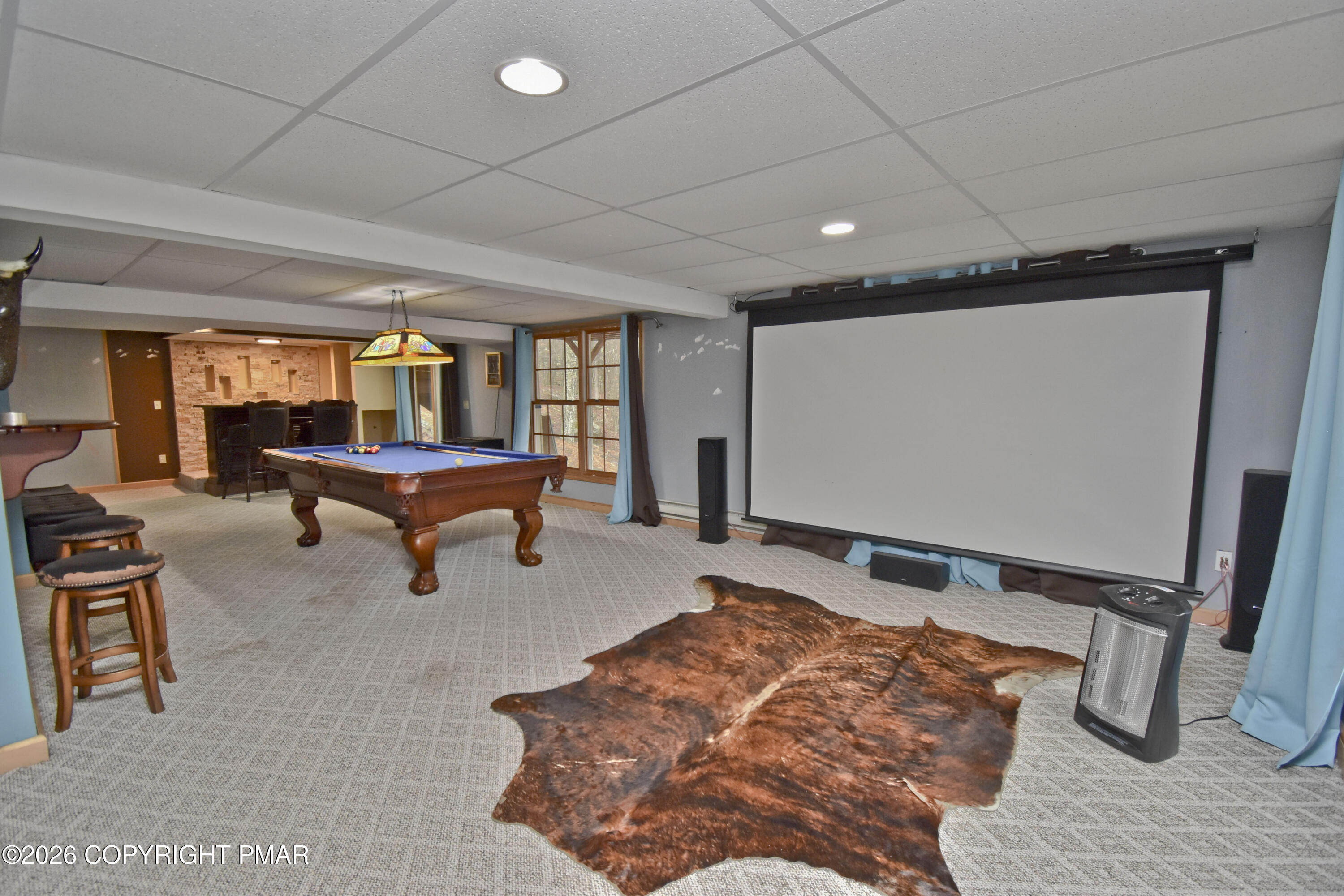 131 Canterbury Road Bushkill, PA 18324 - Photo 41 of 65 a bedroom with furniture and a flat screen tv