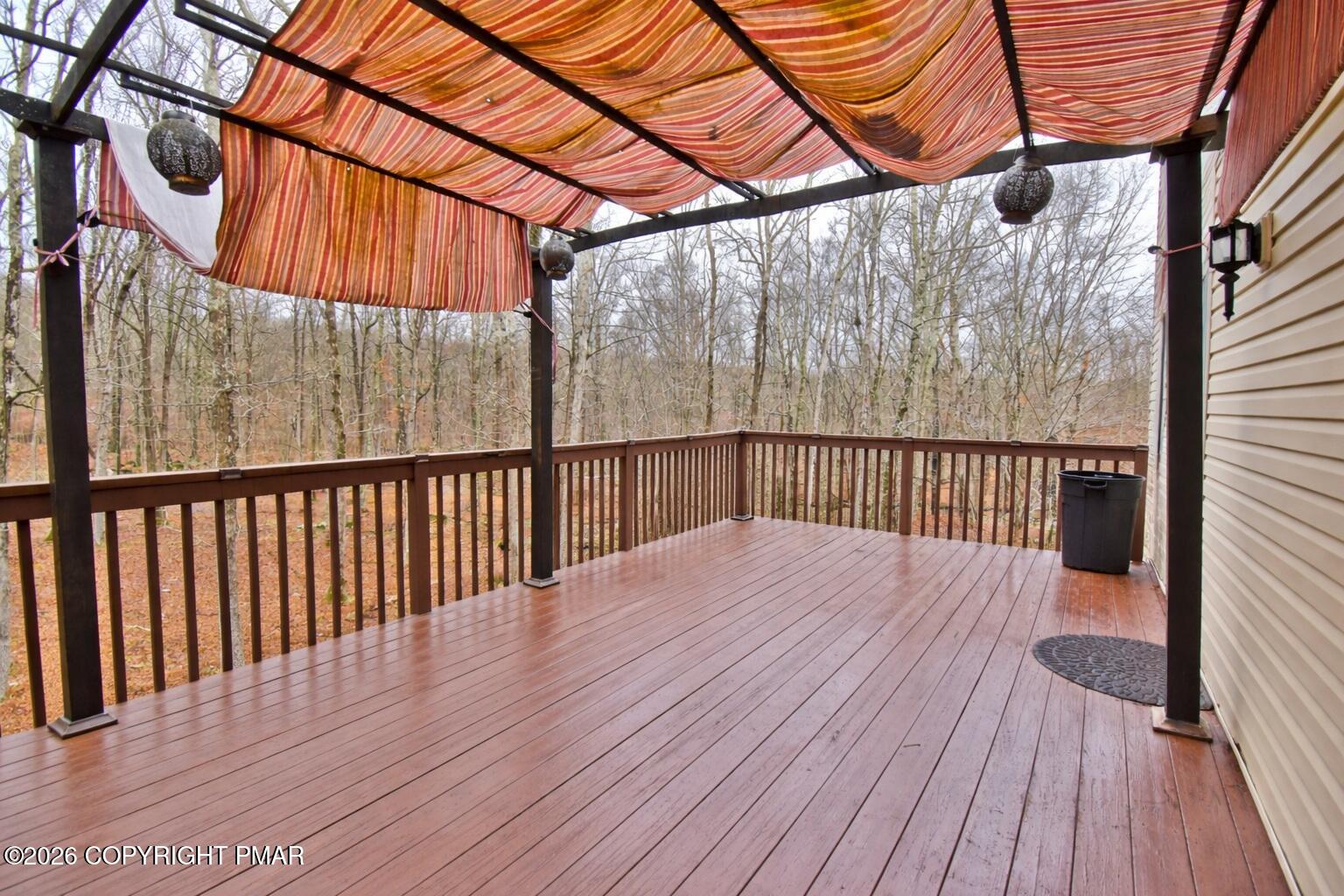 131 Canterbury Road Bushkill, PA 18324 - Photo 49 of 65 a balcony with wooden floor