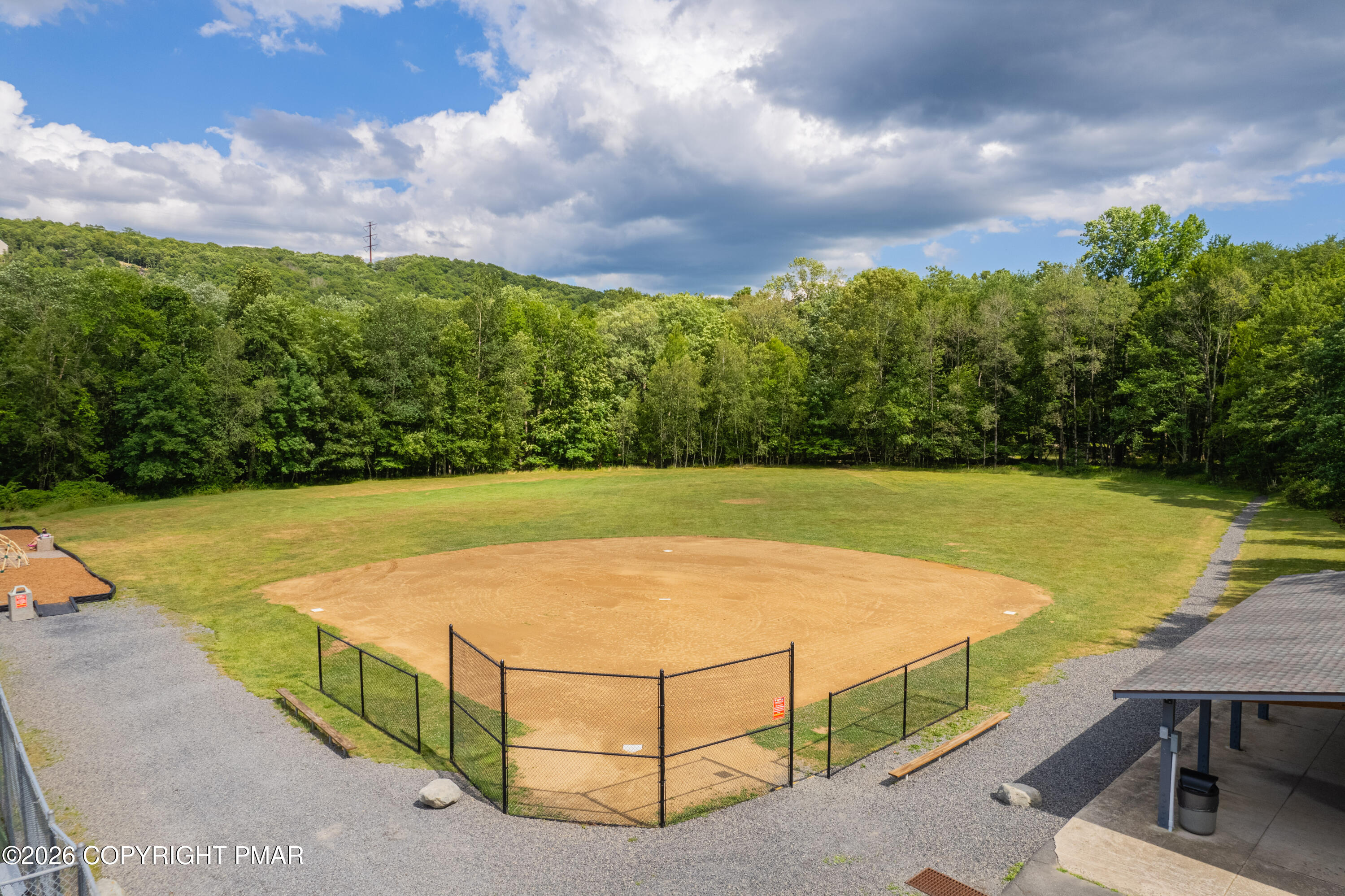 131 Canterbury Road Bushkill, PA 18324 - Photo 59 of 65 a view of a basket ball ground in front of the house