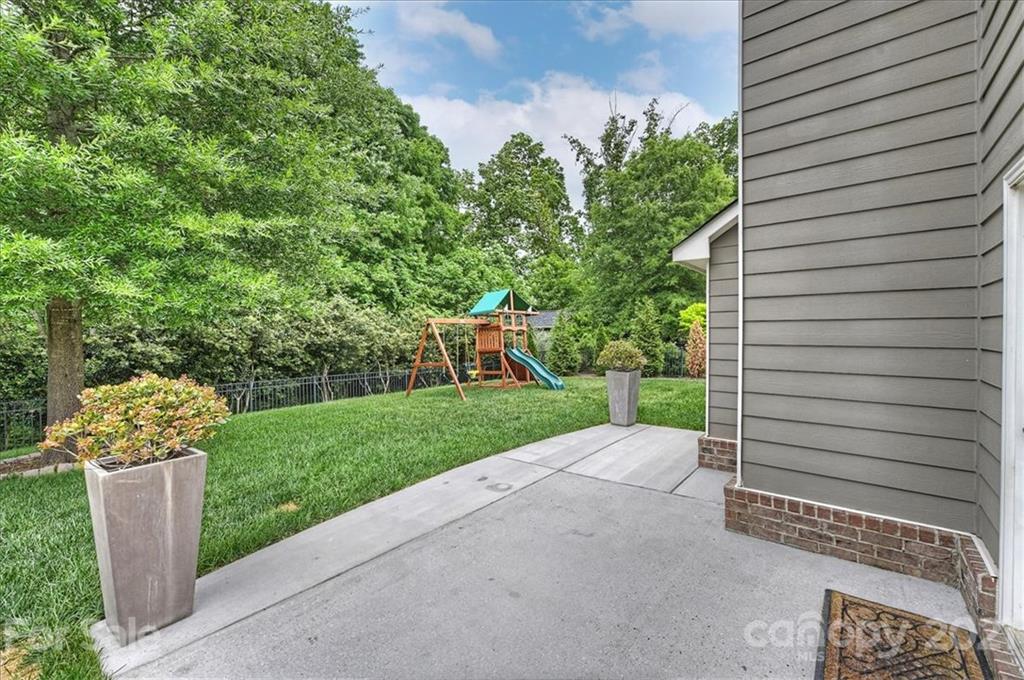 7015 Sedgewick Road Indian Trail, NC 28079 - Photo 4 of 14 a view of a pathway with a garden