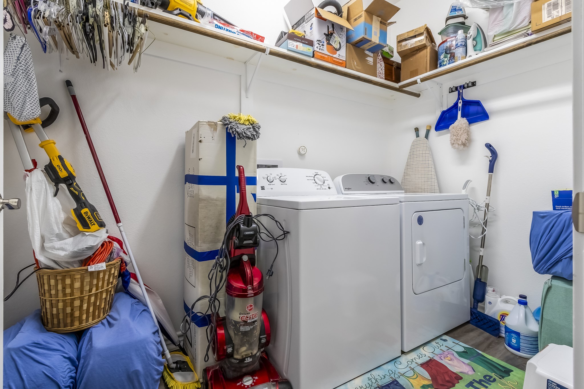 208 County Road 308 Cleveland, TX 77327 - Photo 11 of 32 a utility room with dryer and washer