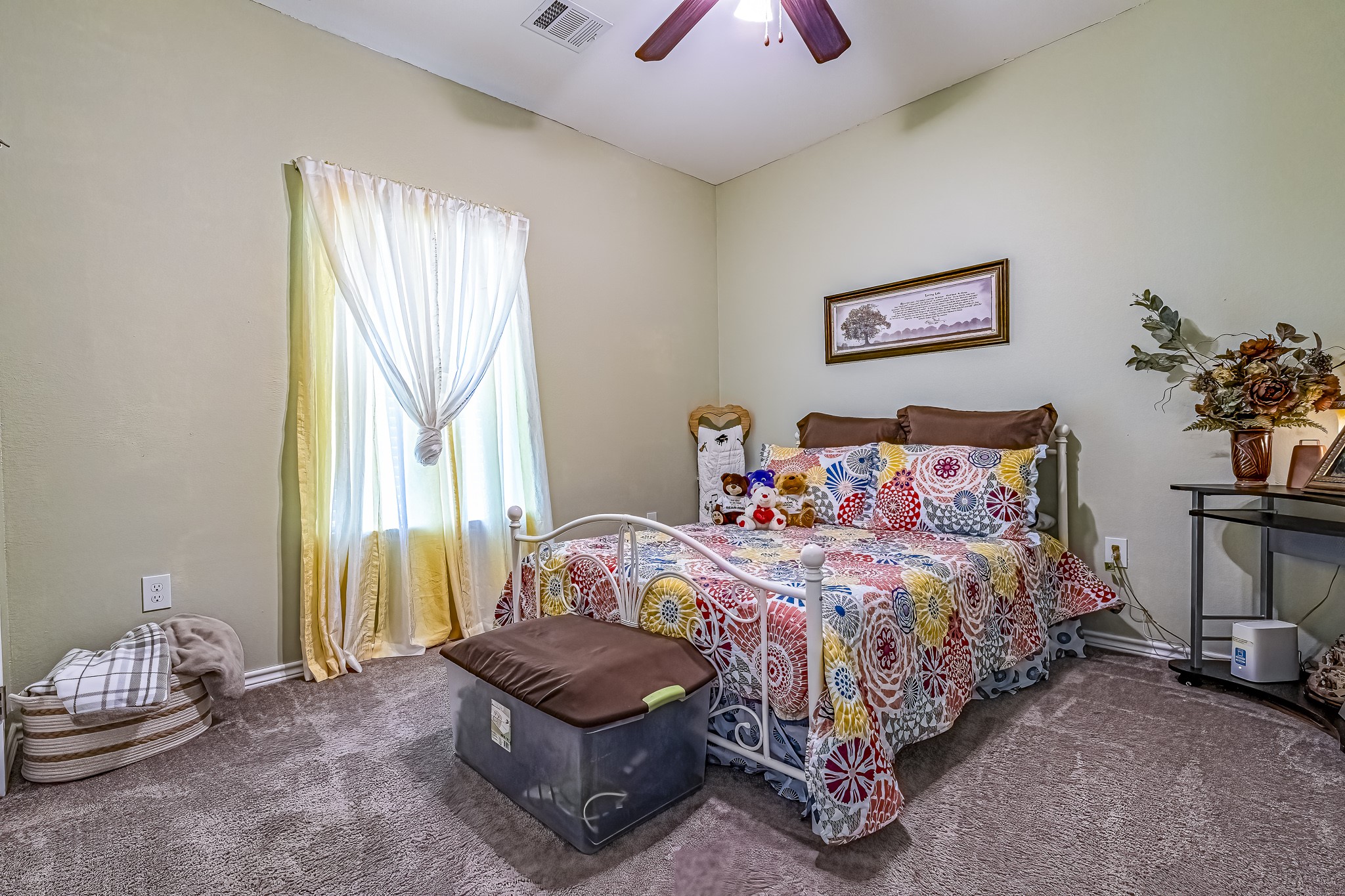 208 County Road 308 Cleveland, TX 77327 - Photo 12 of 32 a bedroom with bed and a window