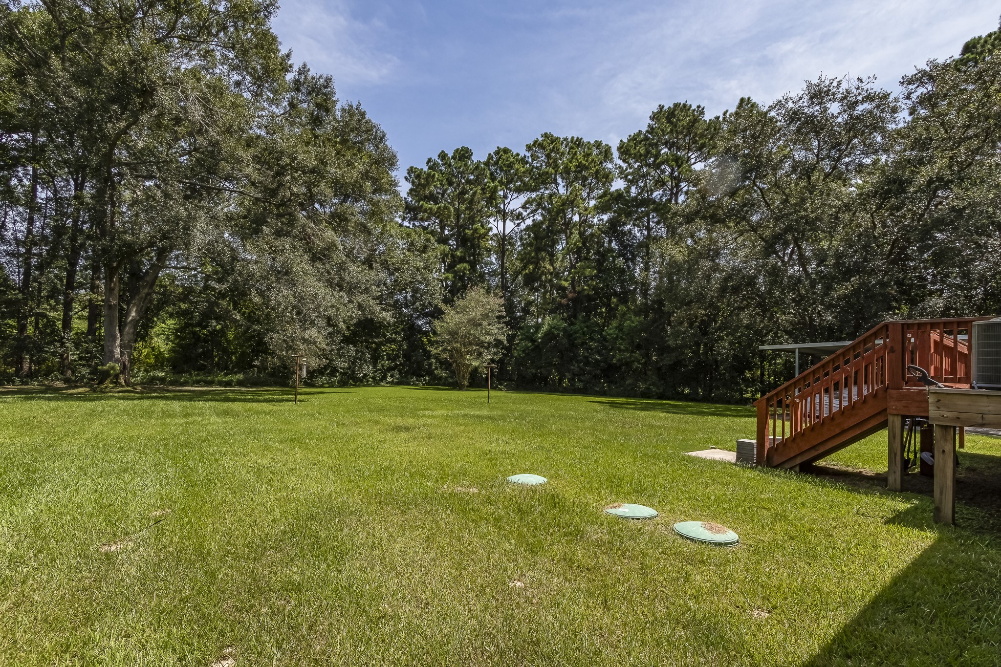 208 County Road 308 Cleveland, TX 77327 - Photo 21 of 32 a view of outdoor space and yard