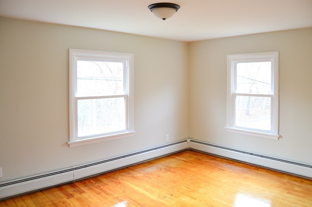 1031 Old Fall River Road Dartmouth, MA 02747 - Photo 12 of 32 an empty room with a window