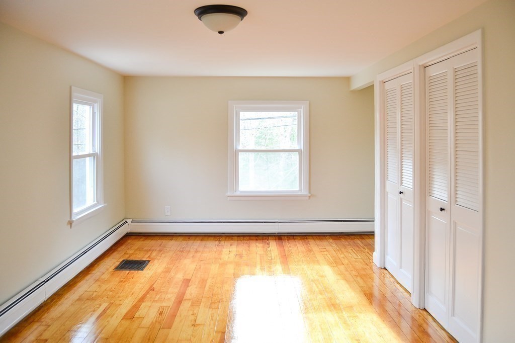 1031 Old Fall River Road Dartmouth, MA 02747 - Photo 17 of 32 a view of an empty room with a window and room