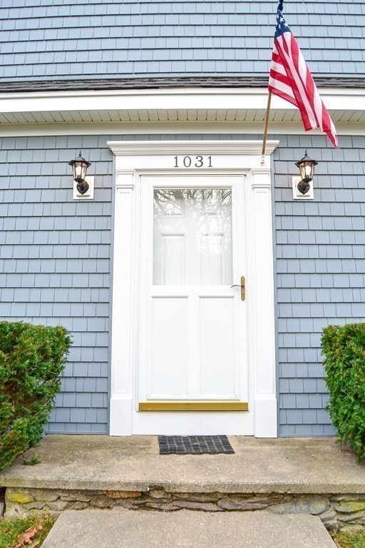 1031 Old Fall River Road Dartmouth, MA 02747 - Photo 2 of 32 a view of a wooden door of a house