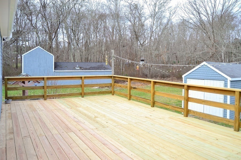 1031 Old Fall River Road Dartmouth, MA 02747 - Photo 21 of 32 a view of an outdoor space and deck