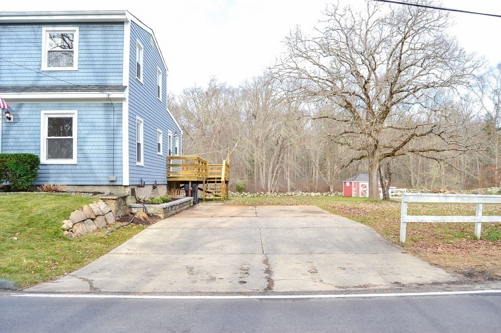 1031 Old Fall River Road Dartmouth, MA 02747 - Photo 25 of 32 a front view of house with yard