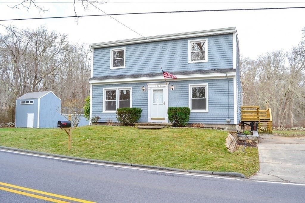 1031 Old Fall River Road Dartmouth, MA 02747 - Photo 28 of 32 a view of a house with a yard and sitting area