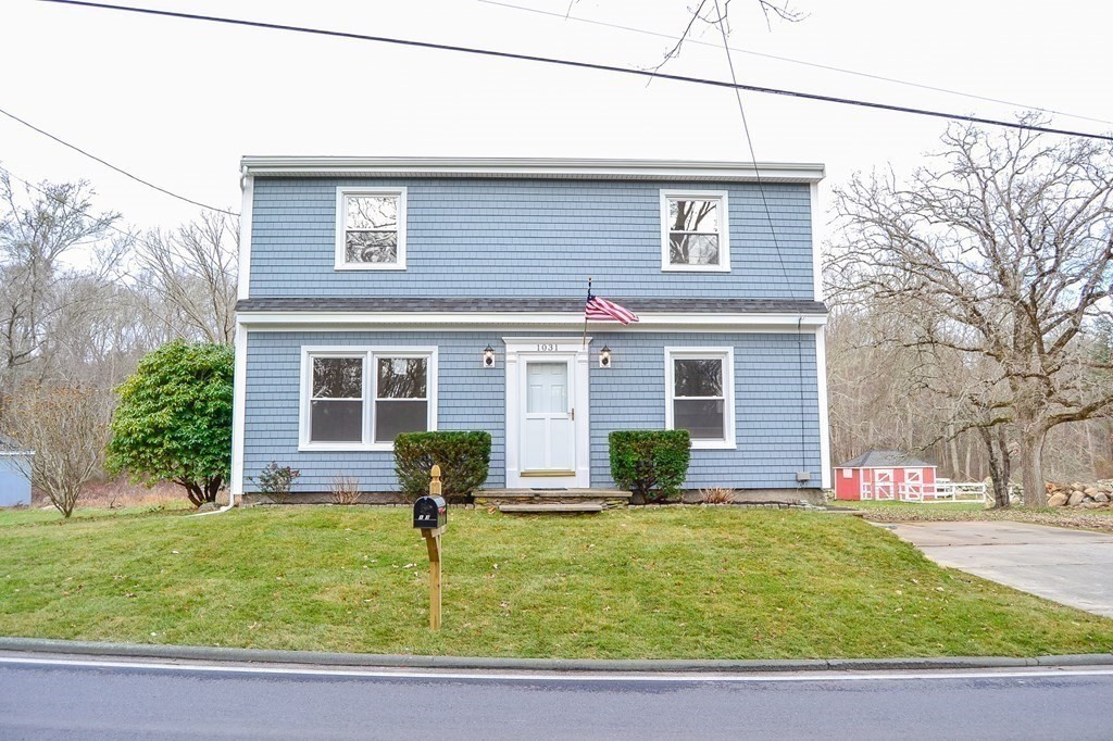 1031 Old Fall River Road Dartmouth, MA 02747 - Photo 29 of 32 front view of a house with a yard