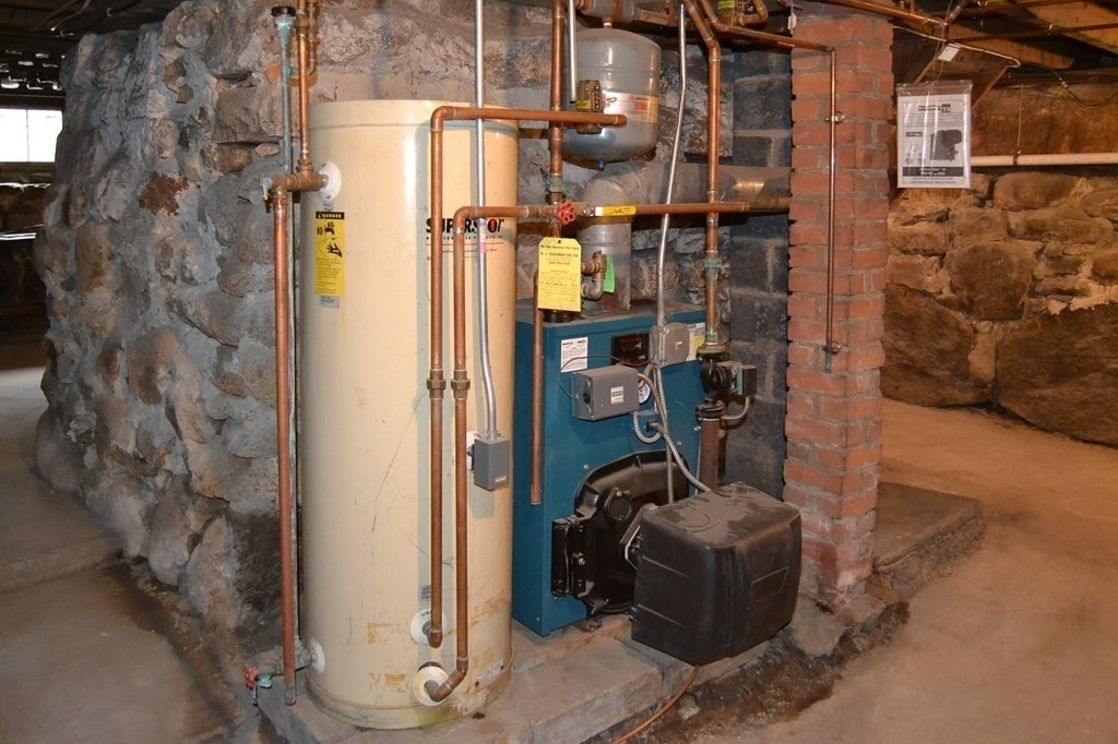 1031 Old Fall River Road Dartmouth, MA 02747 - Photo 32 of 32 a view of a house with a door