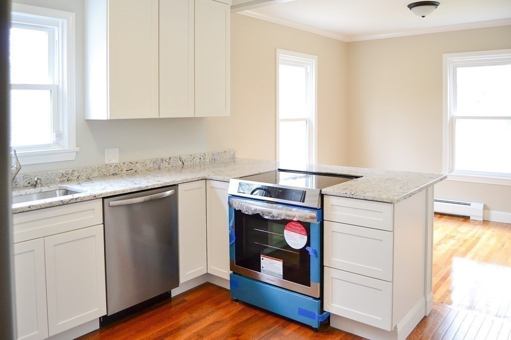 1031 Old Fall River Road Dartmouth, MA 02747 - Photo 6 of 32 a utility room with sink dryer and washer